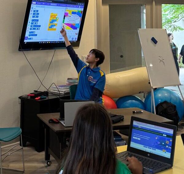 Bridging Cultures and Inspiring Futures – Alex Tang’s Coding Outreach at Casa de Amistad